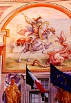 GENOVA - Corpo lato mare di Palazzo San Giorgio. Composizione pittorica sulla facciata raffigurante San Giorgio che uccide il drago, opera di Francesco De Ferrari (1490 ca.)