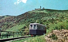 GUIDOVIA SANTUARIO DELLA GUARDIA - Un'auto-motrice diesel sale lungo la linea, in un paesaggio semi-lunare (foto del1956)