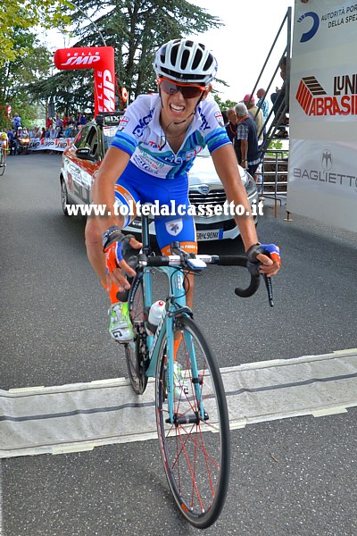 GIRO DELLA LUNIGIANA 2015 (seconda tappa) - Smorfia di fatica per il corridore del team Liguria Filippo Bertone (n.48) mentre taglia il traguardo a Fosdinovo