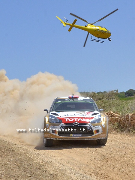 RALLY ITALIA SARDEGNA 2014 - Mads Ostberg (NOR) e Jonas Andersson (SWE) sulla loro Citroen DS3 WRC (n.4) tallonata da un elicottero per le riprese aeree. I due nordici del team Citroen Total Abu Dhabi WRT saranno secondi nella classifica finale