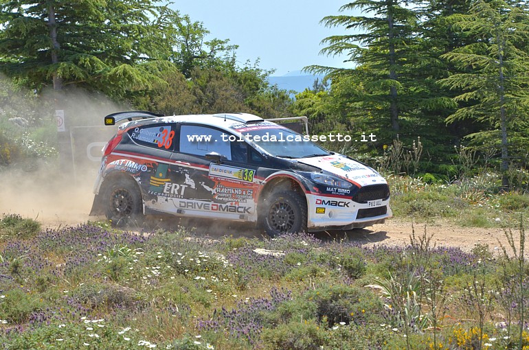 RALLY ITALIA SARDEGNA 2014 - Quentin Gilbert (FRA) e Renaud Jamoul (BEL) su Ford Fiesta R5 (n.38) ripresi mentre attraversano un tratto boschivo. I due hanno terminato la gara al 17 posto della classifica generale