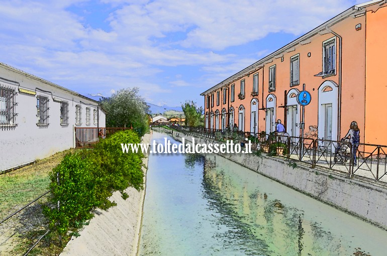 CANALE LUNENSE (Pista Ciclabile) - Immagine con effetto quadro che ritrae l'attraversamento della zona artigianale di Via San Gottardo a Sarzana