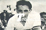 Primo piano di Fausto Coppi durante il giro d'onore con la maglia iridata